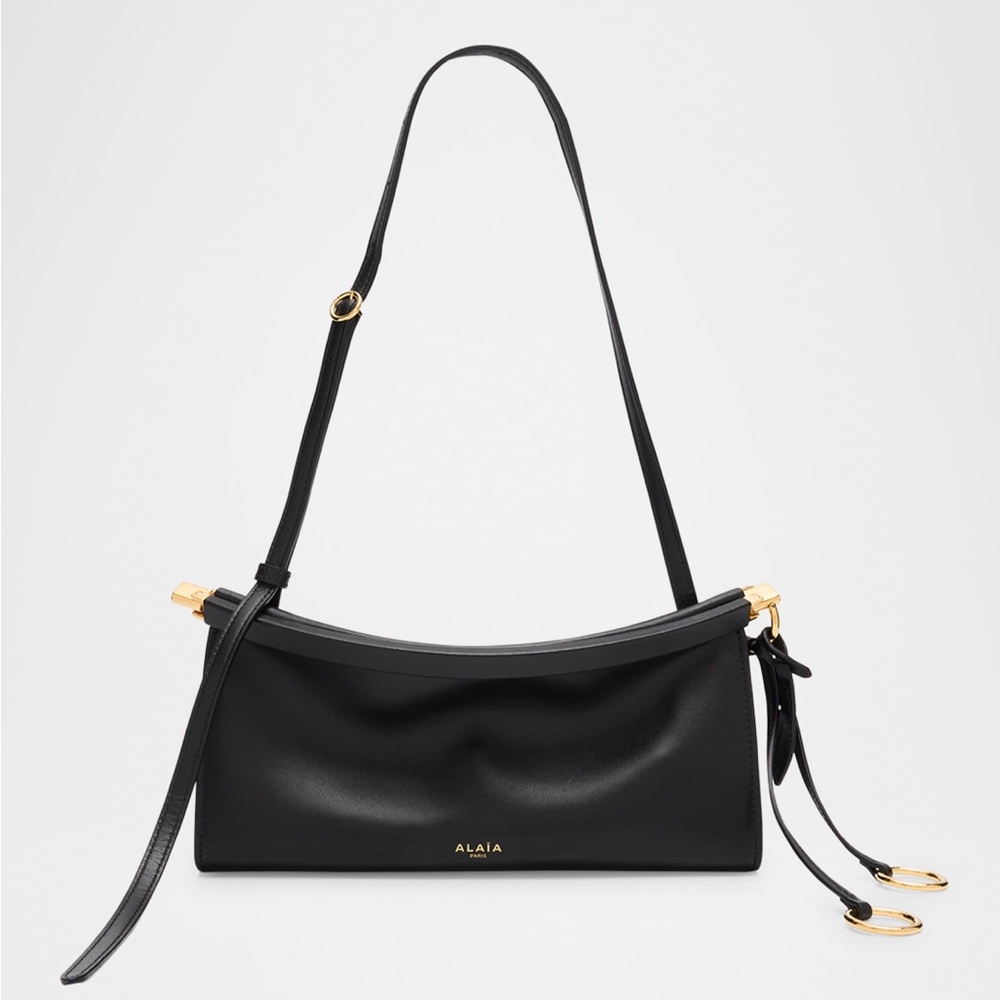 ALAIA Le Click E/W medium leather shoulder bag in glossy leather